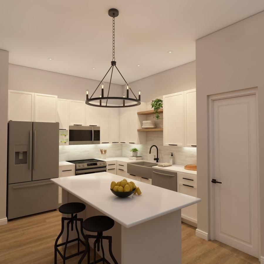a kitchen with white cabinets